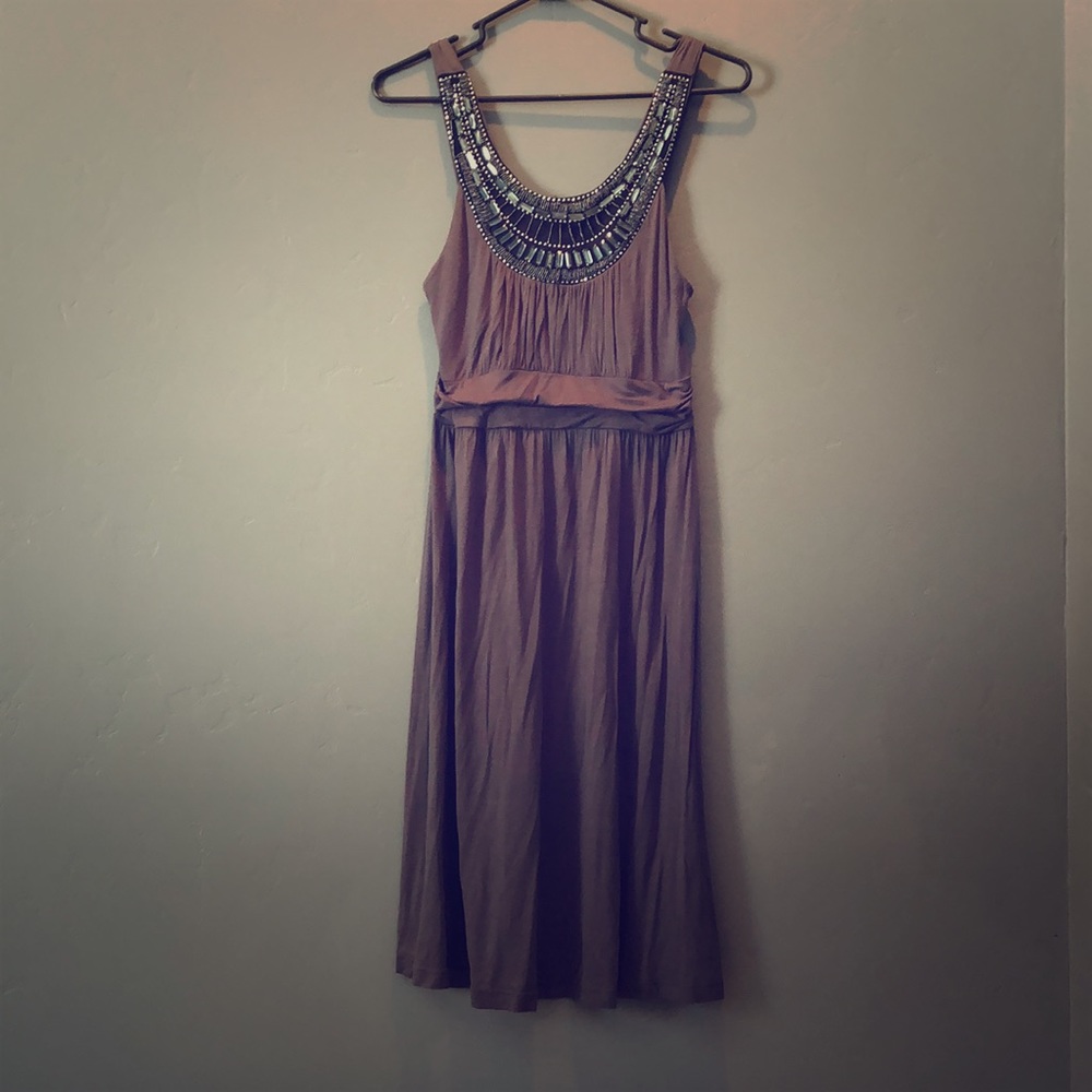 Soprano dress with beaded neckline.